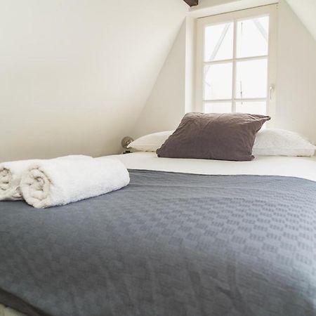Tiny Attic On The Herengracht, Private Room Amesterdão Exterior foto