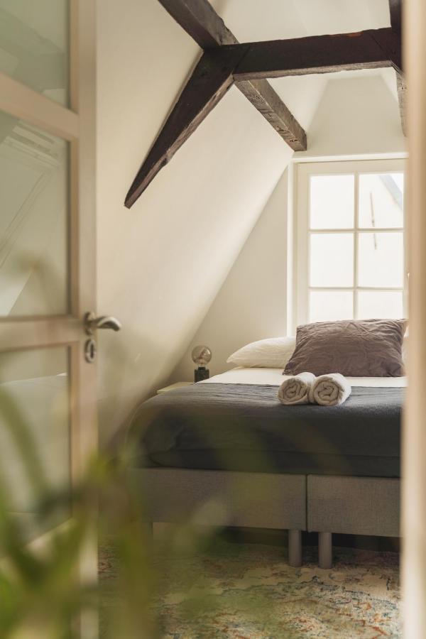 Tiny Attic On The Herengracht, Private Room Amesterdão Exterior foto